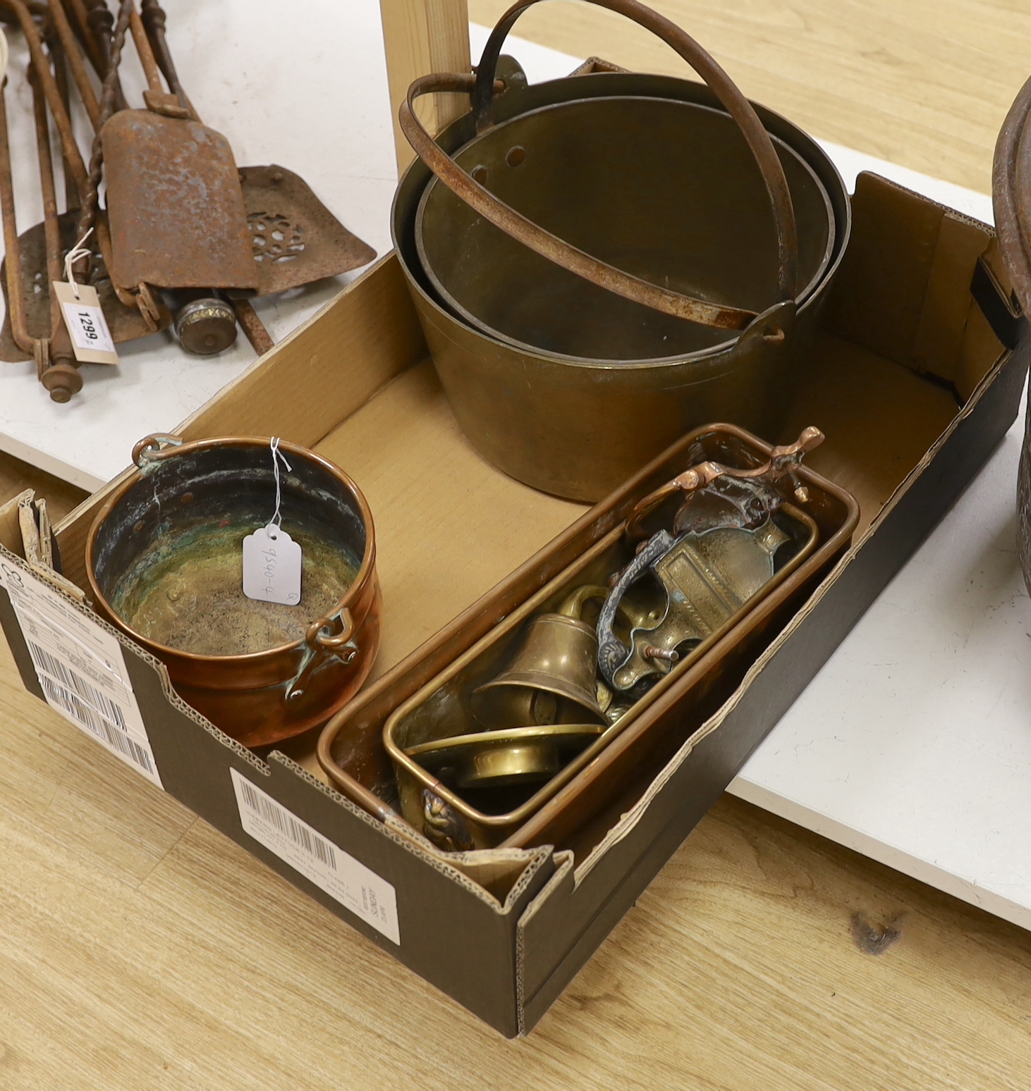 Two brass preserve pans, copper / brass planters, door knockers, etc.